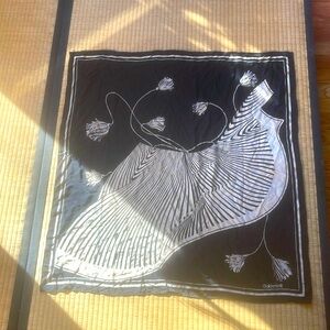 Asymmetrical design. Rolled hem